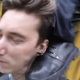 Image for article titled Guy trying to take a selfie gets kicked in the face by train conductor